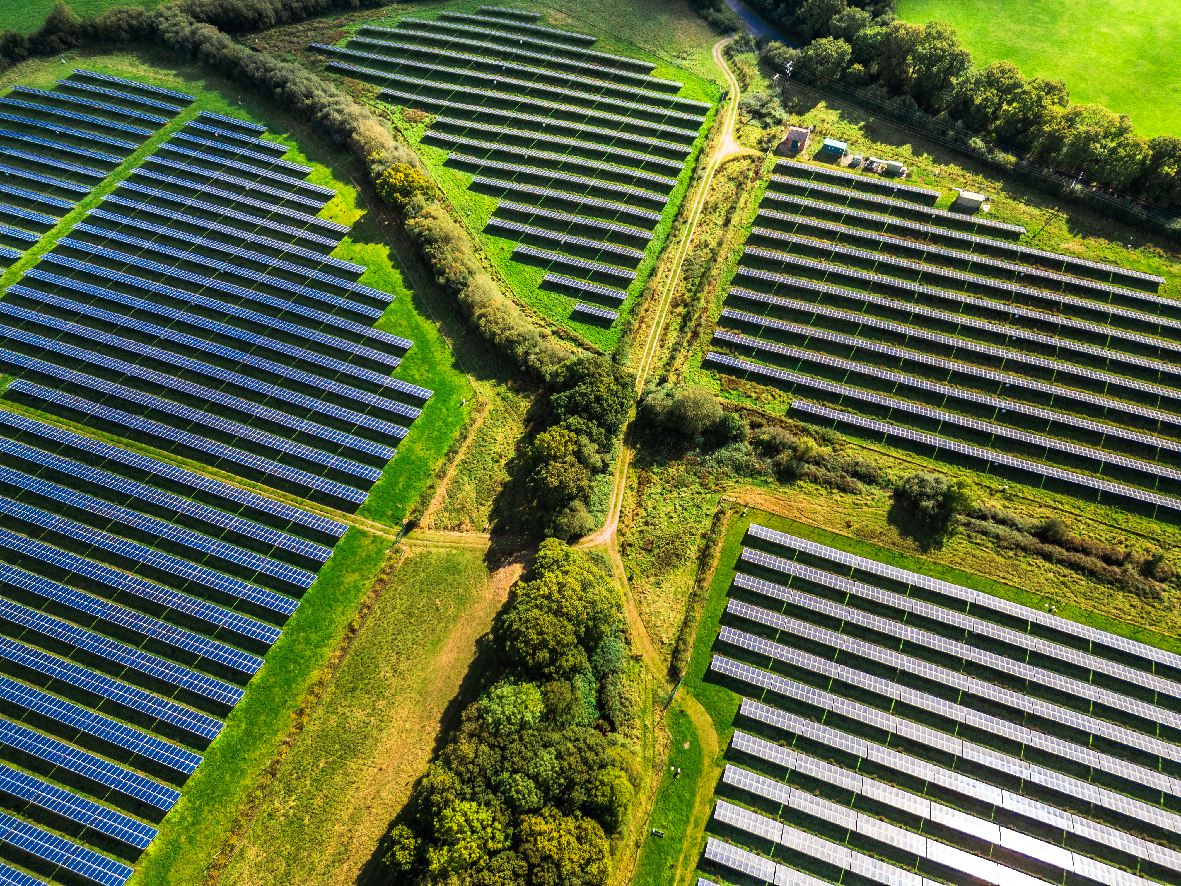 Aerial view of a solar farm integrated into English countryside